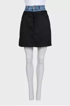 Black skirt with a jeans belt and tag