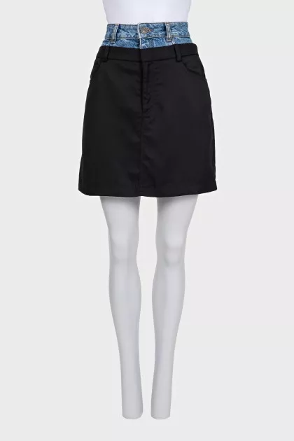 Black skirt with a jeans belt and tag