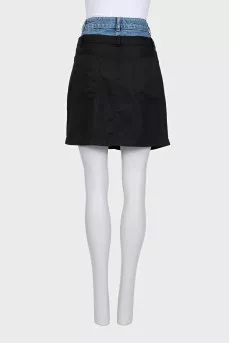 Black skirt with a jeans belt and tag