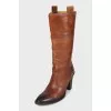 Brown boots with brand logo