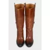 Brown boots with brand logo