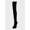 Black suede over-the-knee boots with a zipper