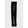 Black suede over-the-knee boots with a zipper