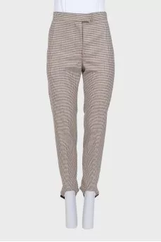 Tapered trousers in a small check with a tag