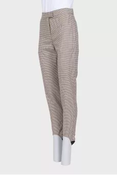 Tapered trousers in a small check with a tag