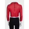 Cropped red leather jacket