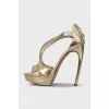 Gold stiletto sandals with zipper