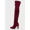 Over the knee boots with lacing at the top
