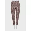 Tapered brown animal print trousers