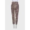 Tapered brown animal print trousers