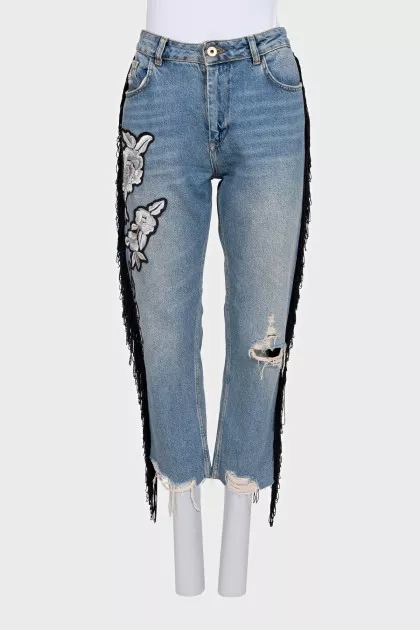 Blue jeans with fringe and embroidery