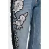 Blue jeans with fringe and embroidery