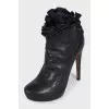 Black leather ankle boots with heels