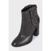 Black boots with metallic rhinestones