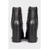 Black boots with metallic rhinestones
