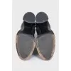 Black boots with metallic rhinestones