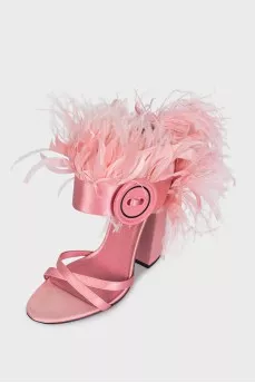 Textile sandals decorated with feathers