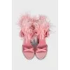 Textile sandals decorated with feathers