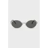 Oval sunglasses with green lenses