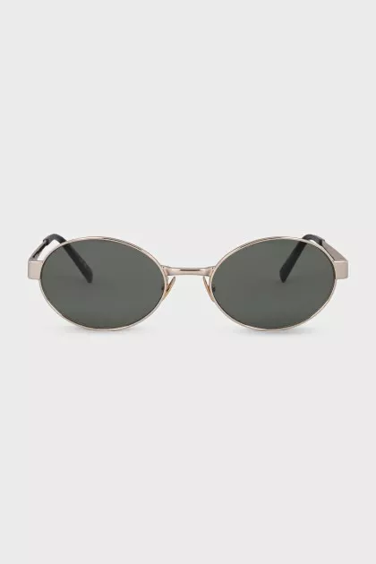 Oval sunglasses with green lenses