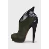 Green high-heeled ankle boots