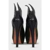 Green high-heeled ankle boots