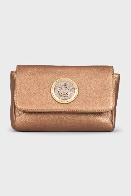 Gold-colored leather cosmetic bag
