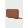 Brown wallet with gold logo