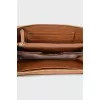 Brown wallet with gold logo