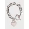Silver bracelet with an accent pendant