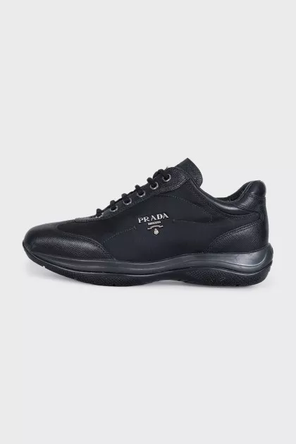 Black sneakers with a brand logo
