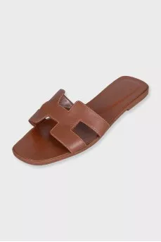 Brown leather flip-flops
