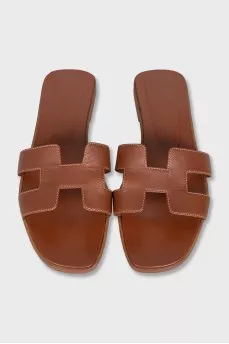 Brown leather flip-flops