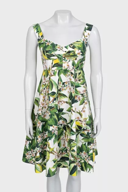Fitted sundress with a green print