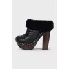 Black ankle boots with wooden heels