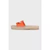 Orange leather and raffia slides