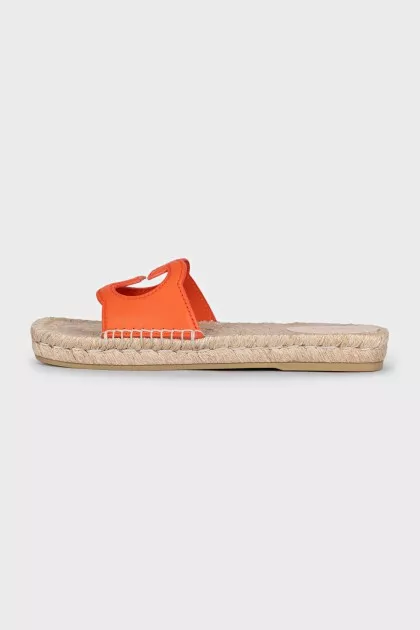 Orange leather and raffia slides