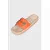 Orange leather and raffia slides