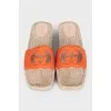 Orange leather and raffia slides