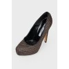 Shoes with golden braid and rhinestones
