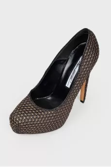 Shoes with golden braid and rhinestones