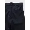 Black tapered trousers with zippers on the trousers