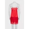 Dress with thin straps decorated with lace