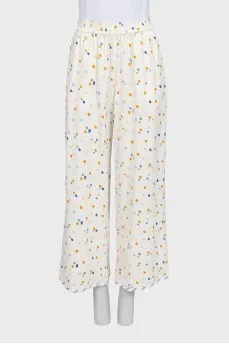 Широкие брюки в разноцветный принт
