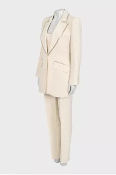 Beige suit with trousers, top and jacket