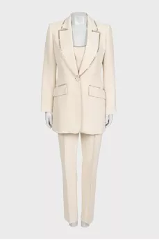 Beige suit with trousers, top and jacket