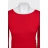 Red dress decorated with gold buttons