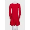 Red dress decorated with gold buttons