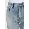 Light blue ripped jeans with distressing