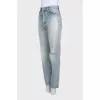 Light blue ripped jeans with distressing